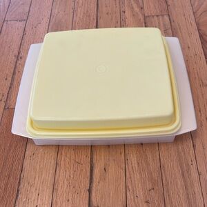 Pearl white and yellow Tupperware container